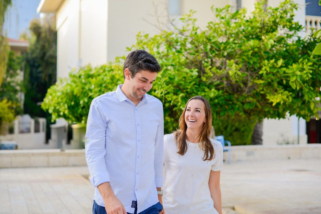 walking couple in Neve Tzedek engagement photographer Toronto