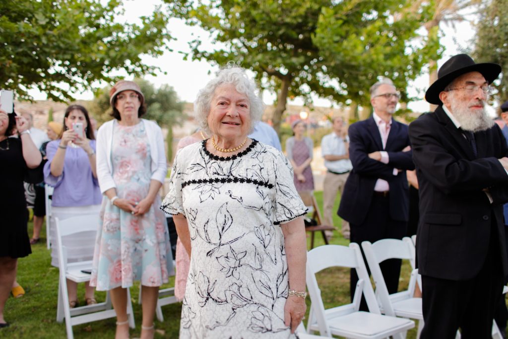 elderly woman smiling at outdoor desert wedding photography session