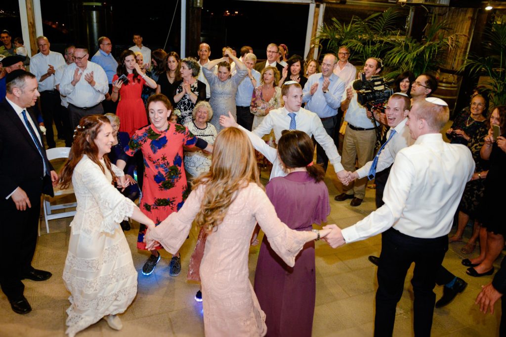 horah dance at jewish jerusalem desert wedding photography session