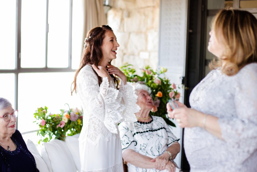 laughing bride with friends