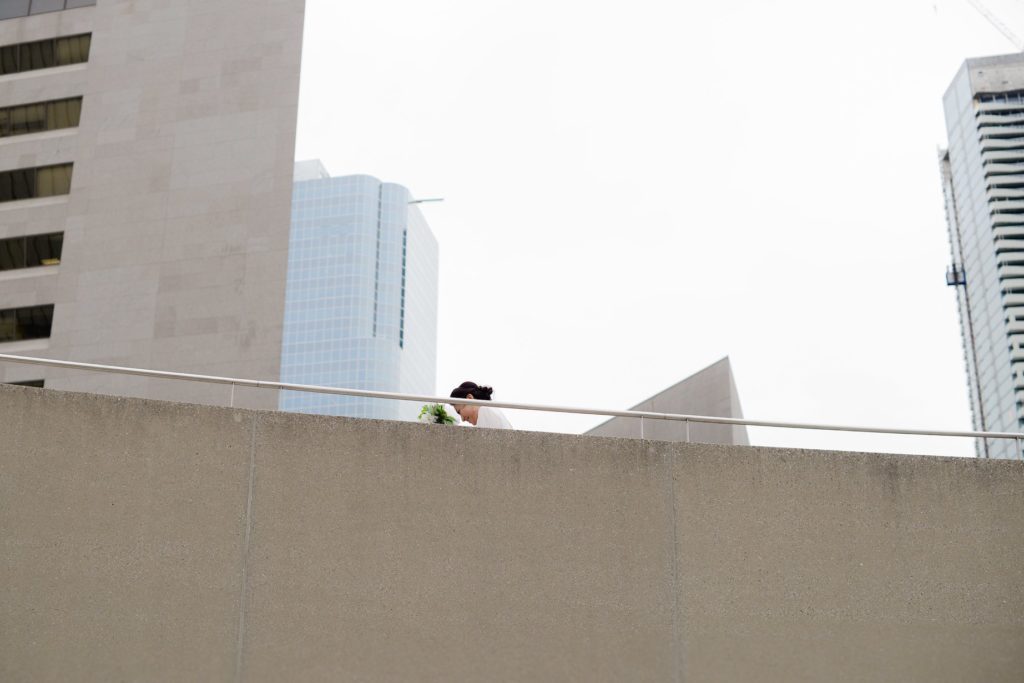 wedding photoshoot with bride on toronto city hall