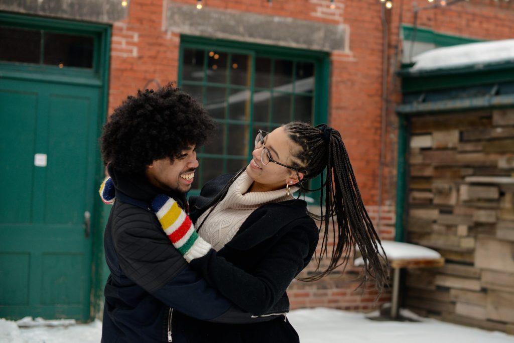 toronto couples photoshoot with laughing and hugging couple 