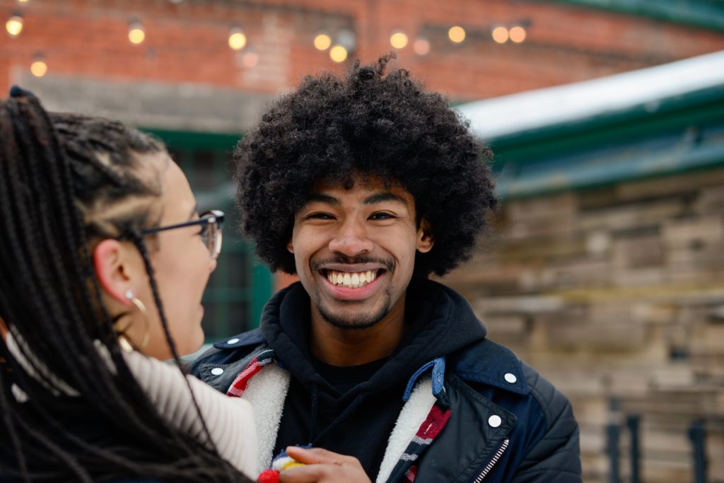 smiling man looking at camera