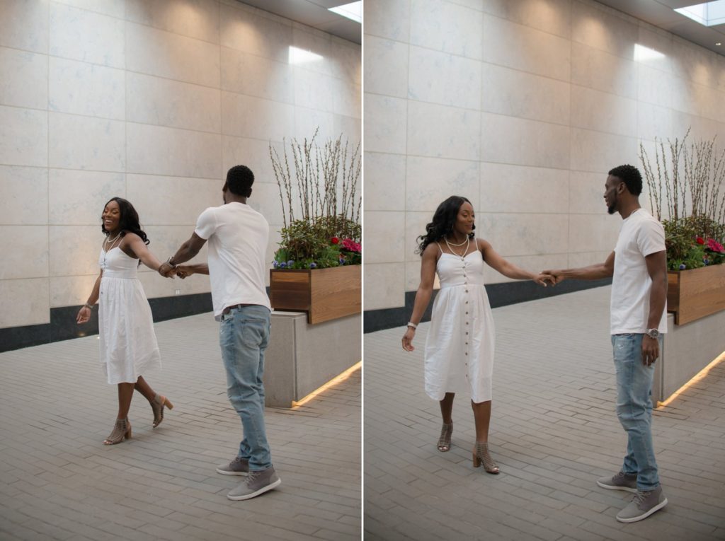 Young Jamaican couple dancing for engagement photos