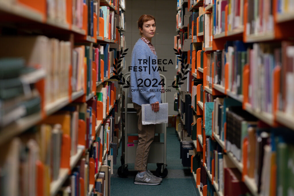 Britt Lower playing Miriam Gordon in Darkest Miriam stand at the end of a library hall for the Tribeca Film Festival poster